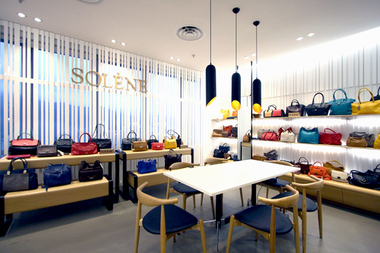 The rise of the tie brand handbag store