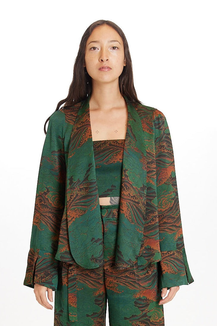Title:  pairing a deep forest green suit with the perfect tie