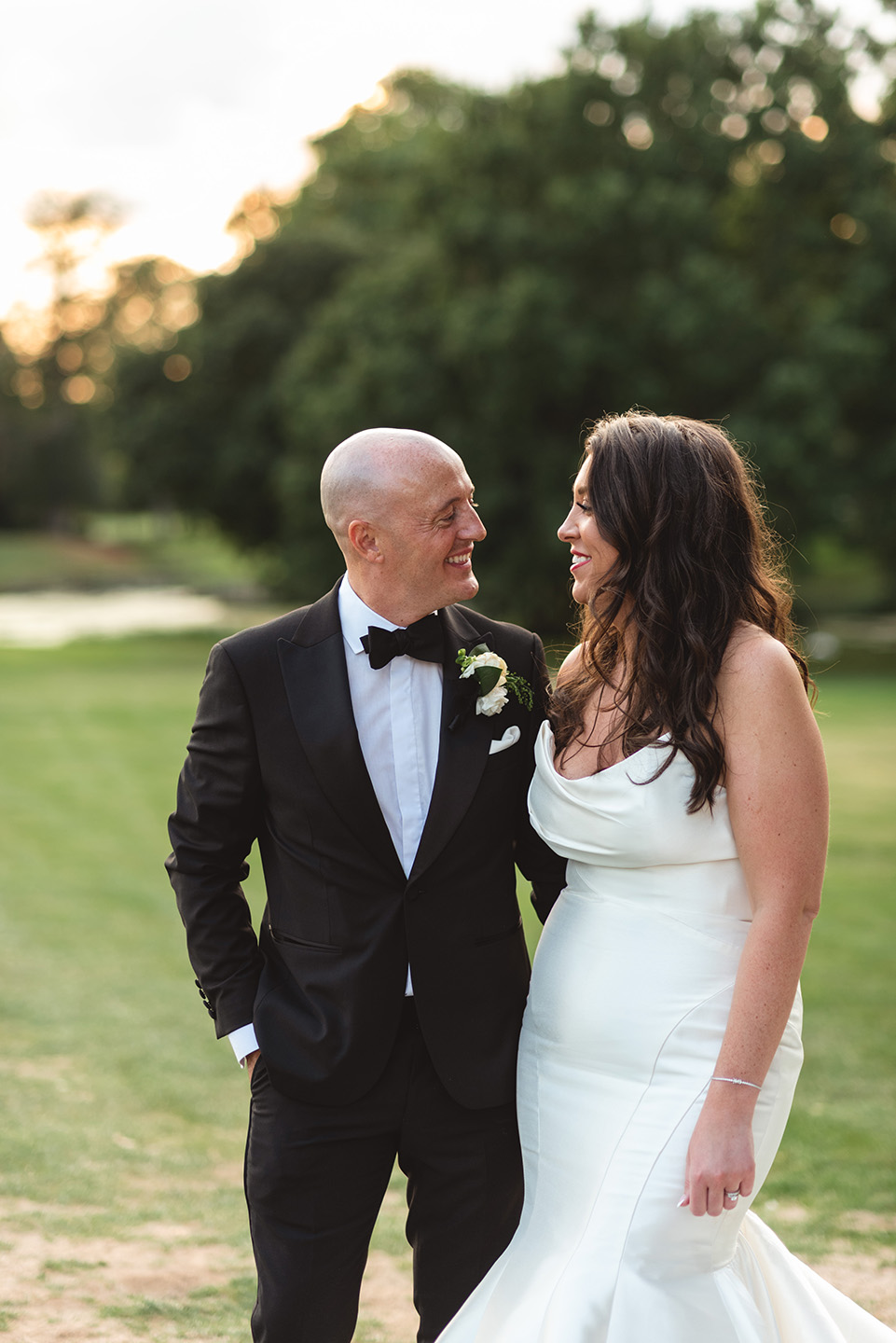 Title: Capturing the Joy: A Symbolic Wedding Photo with a Wedding Tie in the Collar