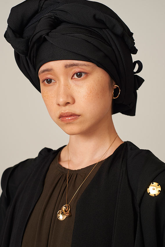Title: Unraveling the Elegance: A Masterpiece of Japanese High-End Tie Brand for Ladies Coats