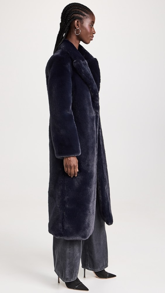 Title: The Allure of Lamb Fur Coats with zipper closures and collar-less designs