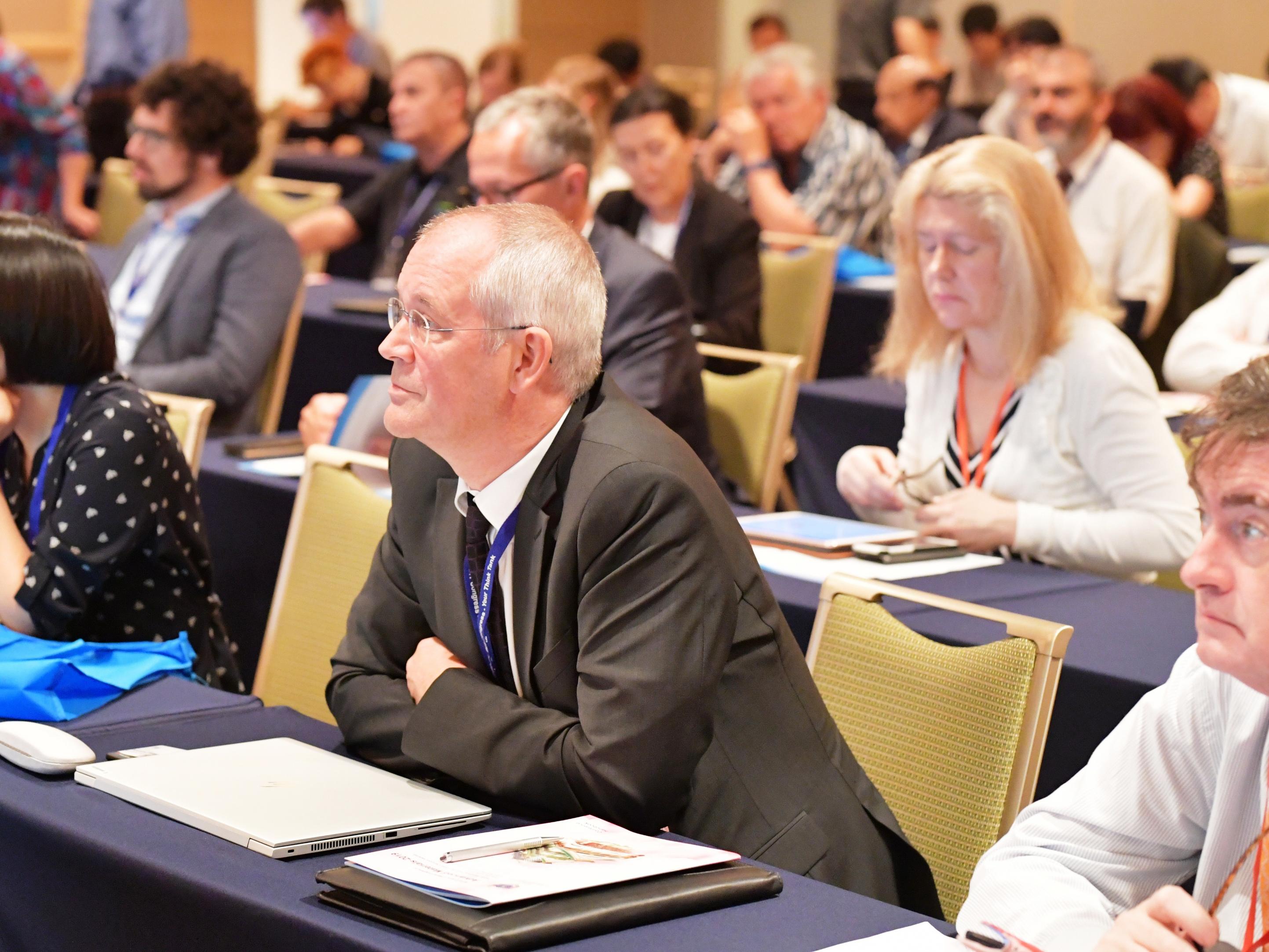 Title: The Importance of Formal Attire and Ties for Business Conferences