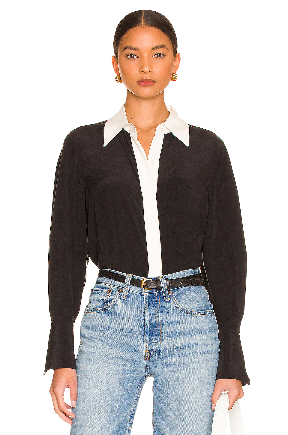 Title: Embracing the Power of Minimalism: The Subtle Allure of a White Blouse and Black Suit for Women