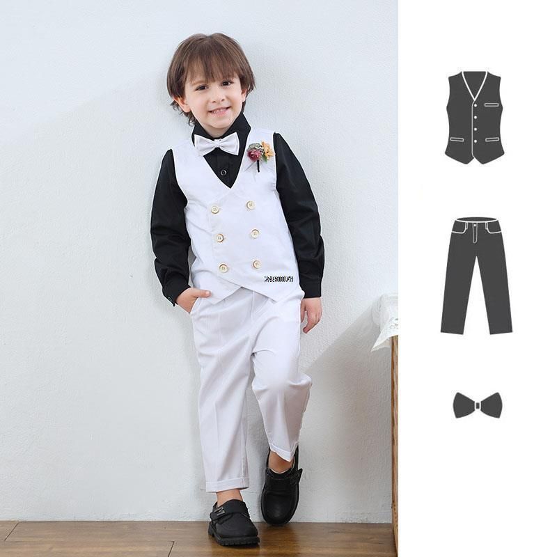 Title: The Art of Combining Form and Function with White Shirt and Black Tie Boys Childrens Suits