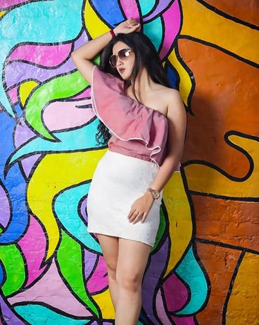 Embroidered Waistcoat and Denim Shorts: The Timeless and Stylish Look for Women