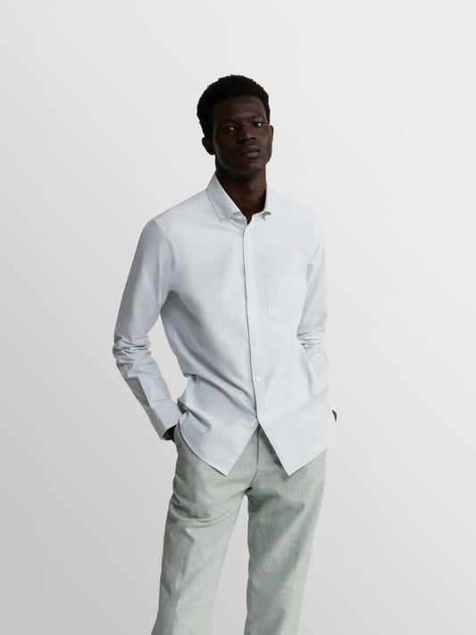 Title: Mastering the Art of Wearing a Formal Button-Down Shirt with Tie: A Guide for Male Stylists