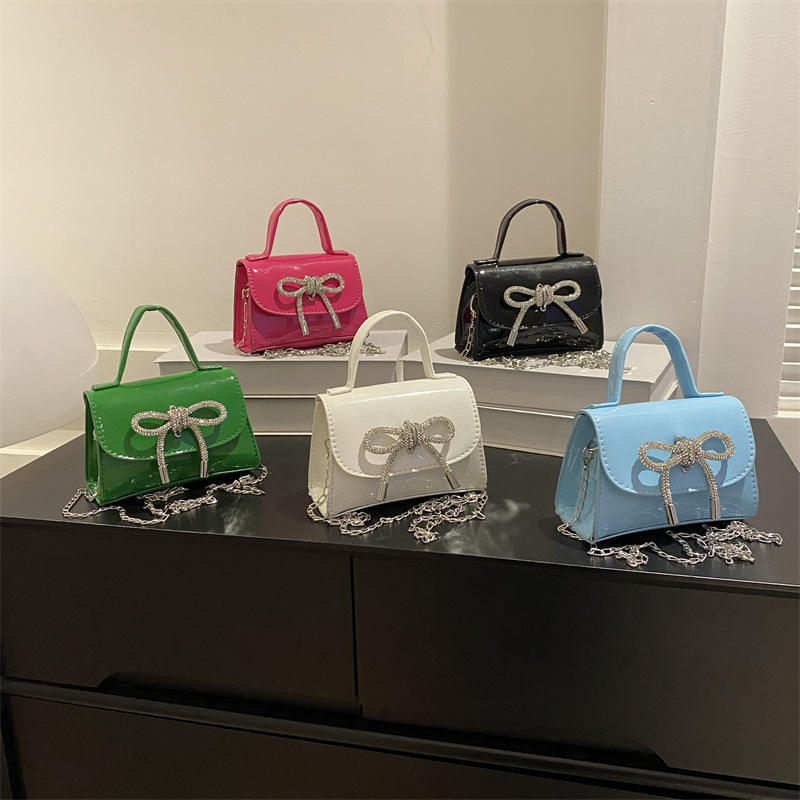 Top 5 Women’s Tie Brands and Bags to Match