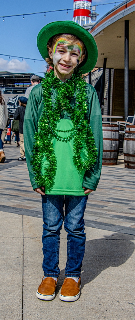 Title: The Childrens Wear Brand Name with a Green Tie