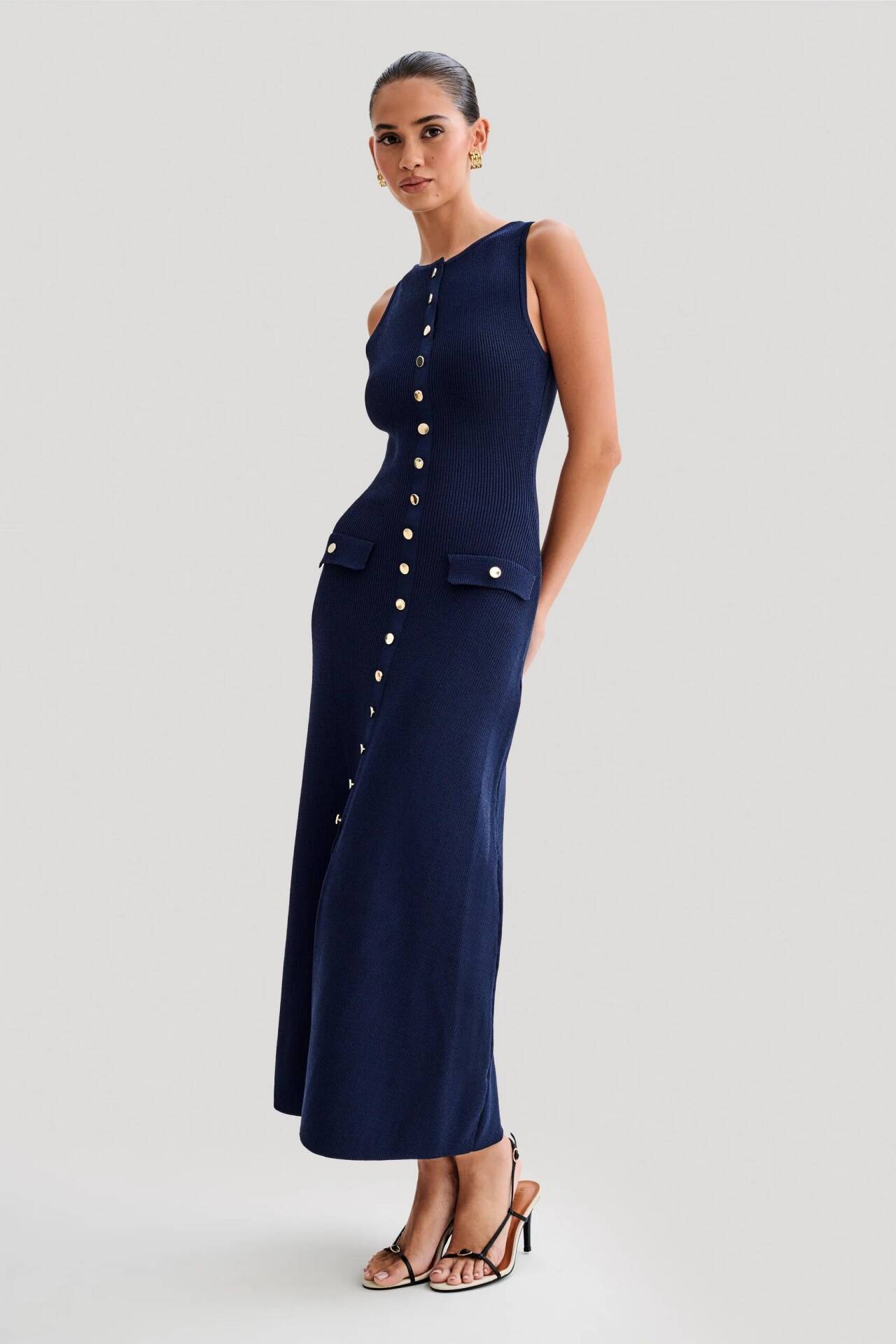 The Unique Charm of a Long-necked Book, Tie, and Long Dress