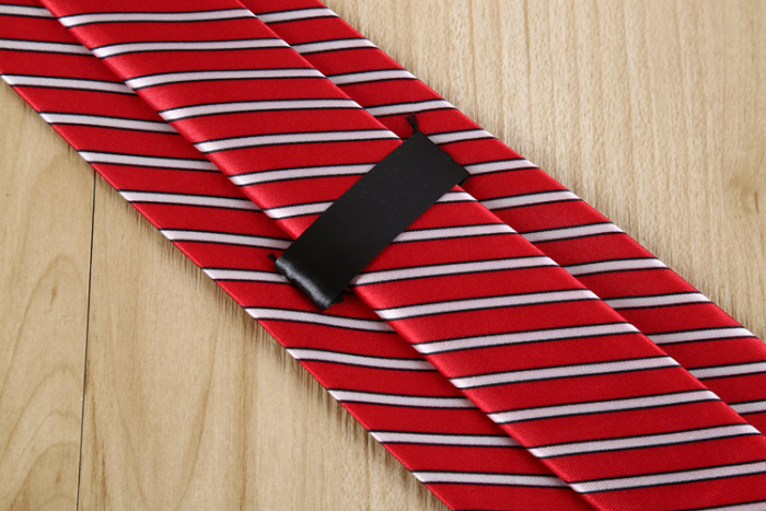 The Alluring Power of a Deep Red Striped Tie