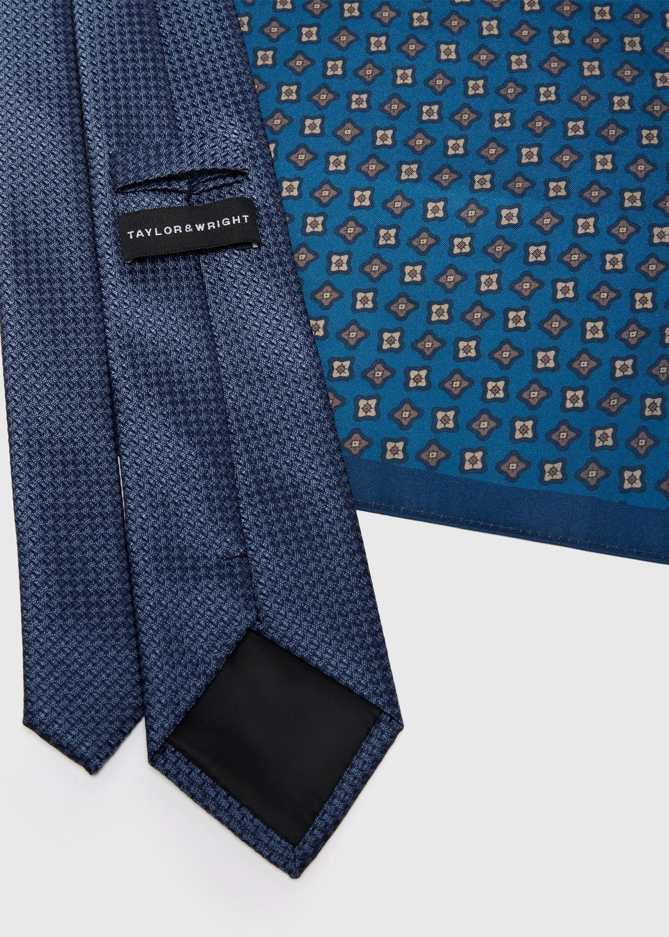 The Brand Behind the Greek Blue Tie